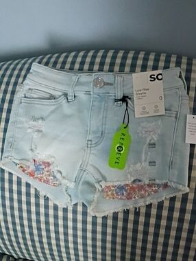 Light Blue Distressed Low-Rise Denim Shortie with Floral Pockets